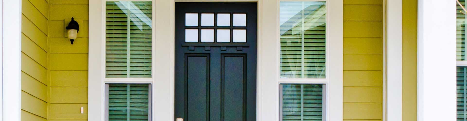 Front door on a yellow house